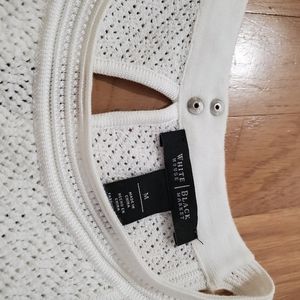 White Sleeveless knit top